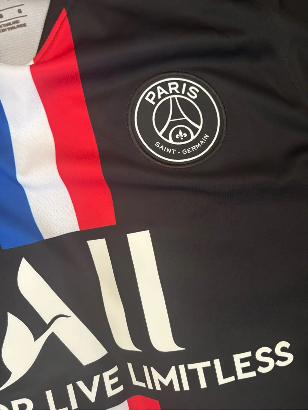 Jordan Men’s Black PSG Football Jersey with Red, White & Blue Stripes